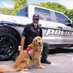 Canines Bring Calm to the Courtroom Corporal Jeff Perry of Naples Police Department with Max. Photo courtesy of Courtesy of Golden PAWS Assistance Dogs