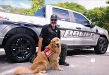 Corporal Jeff Perry of Naples Police Department with Max. Photo courtesy of Courtesy of Golden PAWS Assistance Dogs