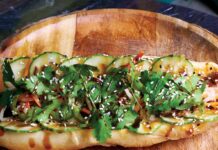 Two Local Restaurants Earn Michelin Guide Florida 2026 Nods The Imperial Banh Mi, a gourmet sandwich at The Bohemian. Photo by Chris Millamena
