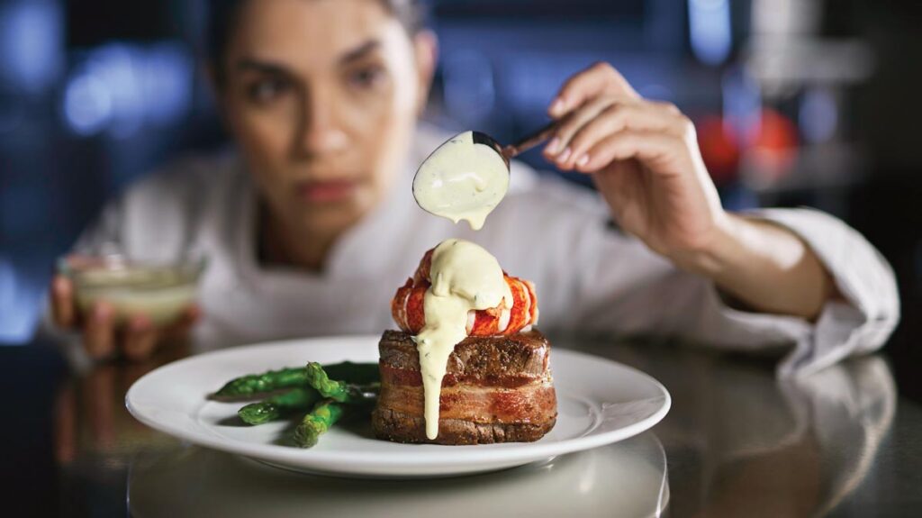 Filet medallions with lobster tail, Oscar style. Photo courtesy of Eddie V’s Prime Seafood