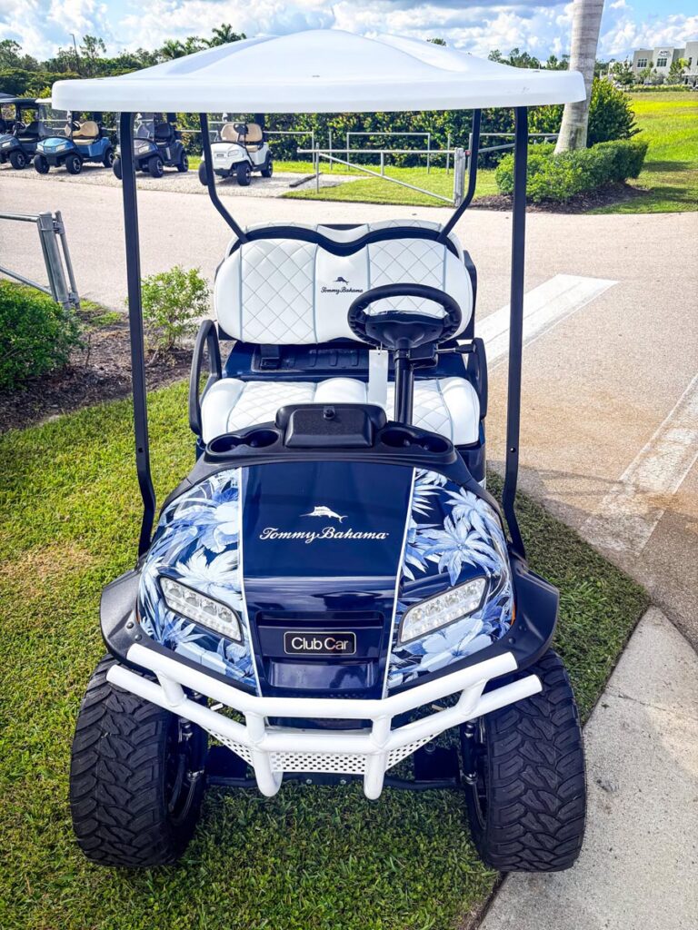 Limited-edition 2026 Tommy Bahama Club Car Onward Lifted four-passenger golf cart.